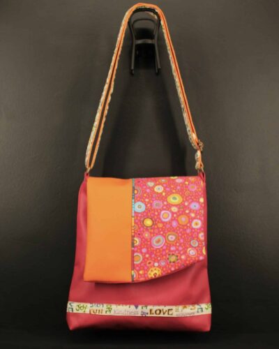 Sac rose, orange et bulles multicolores